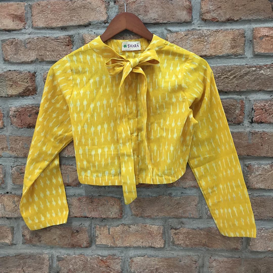 Clothing,Yellow,Outerwear,Sleeve,Jacket,Textile,Collar,Pattern,Top,Shirt