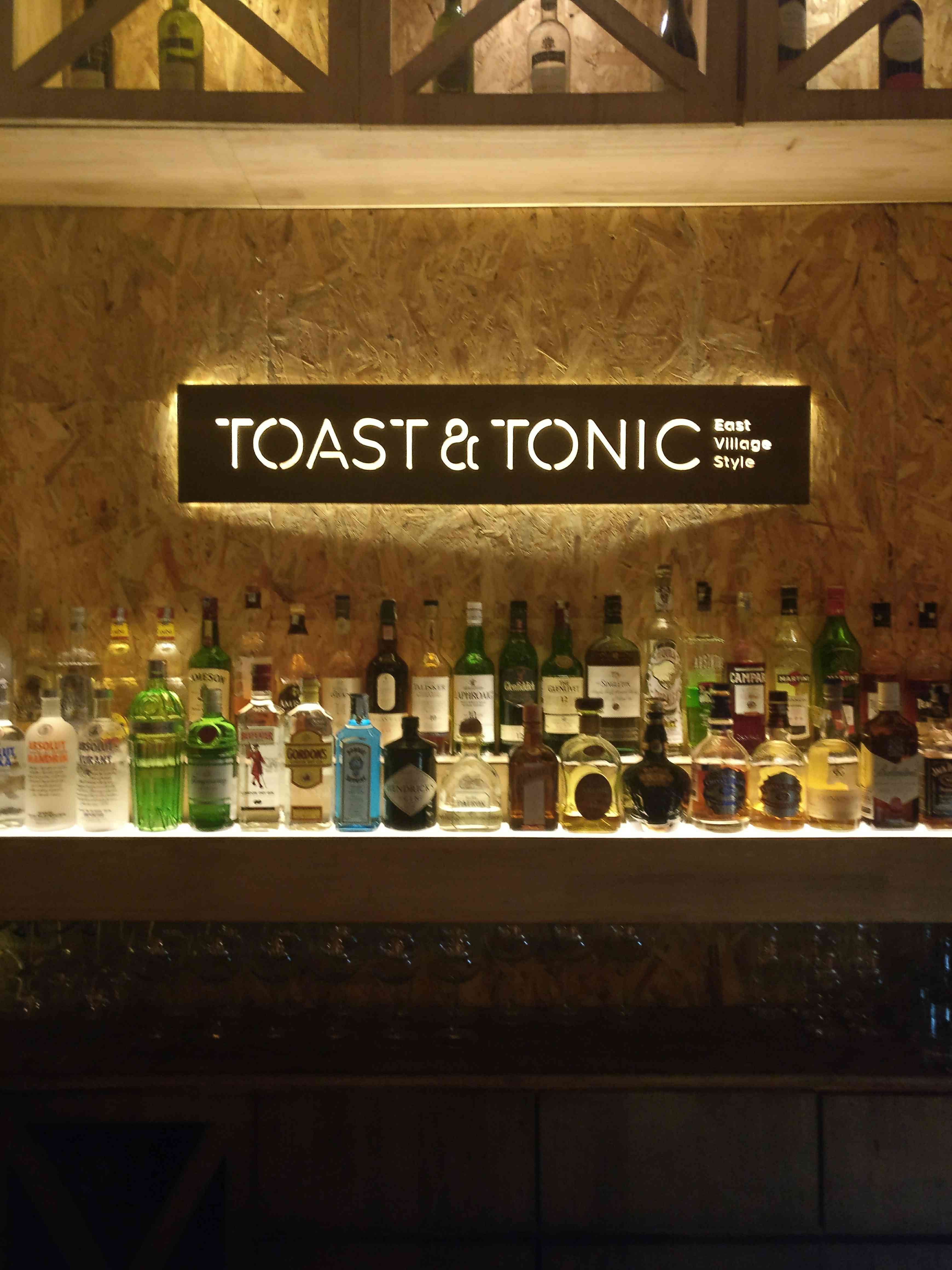 Bar,Liqueur,Alcohol,Drink,Distilled beverage,Glass bottle,Building,Barware,Bottle,Wine bottle