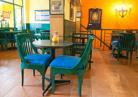 Room,Table,Furniture,Property,Turquoise,Building,Floor,Chair,Restaurant,Interior design