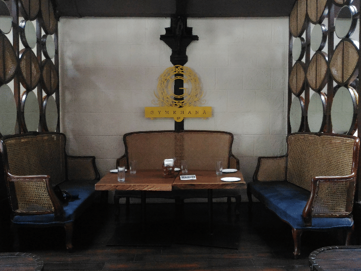 Furniture,Room,Interior design,Table,Chair,Religious item,Building