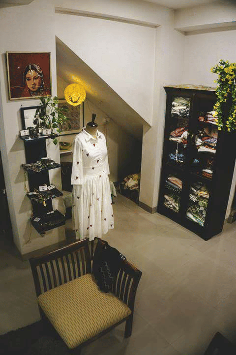 Room,Interior design,Furniture,House,Floor,Architecture,Collection,Shelf,Plant,Costume