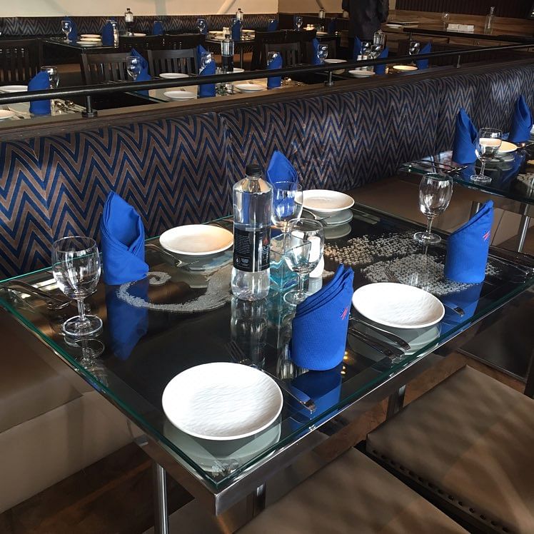 Porcelain,Blue,Table,Cobalt blue,Blue and white porcelain,Room,Countertop,Furniture,Meal,Interior design