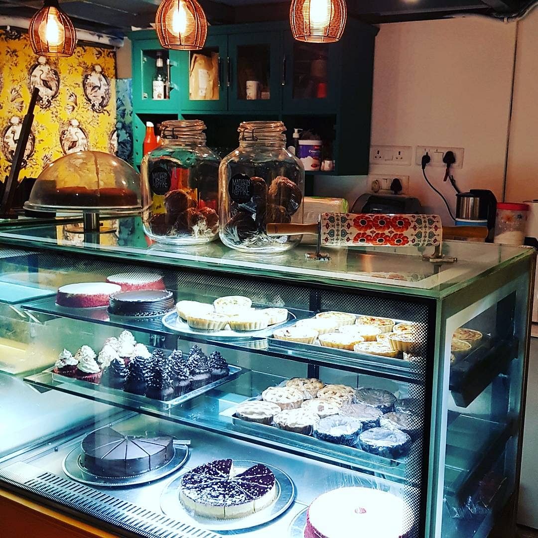 Food,Pâtisserie,Bakery,Pastry,Cuisine,Display case,Dessert,Building,Interior design,Delicacy