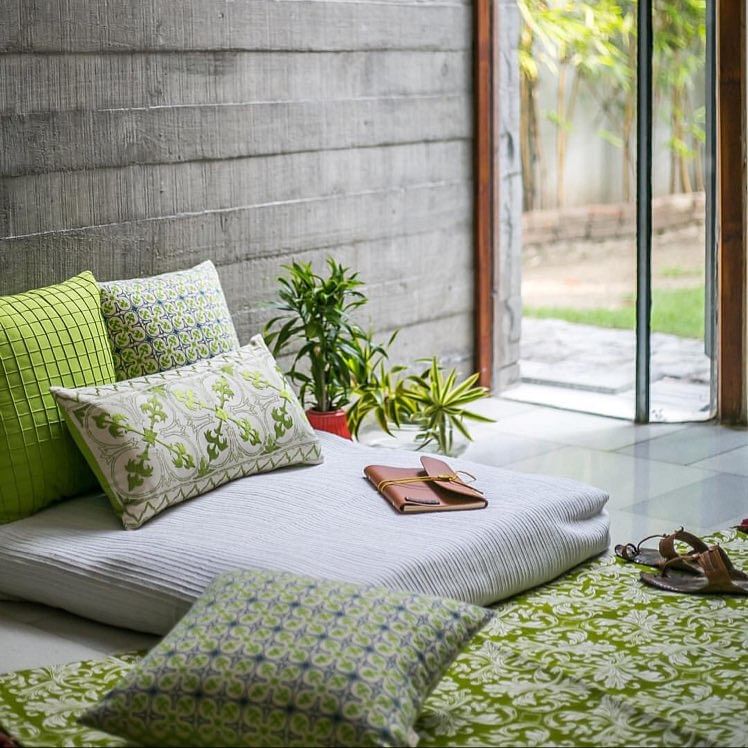 Furniture,Green,Room,Living room,Interior design,Couch,Pillow,Home,Table,studio couch