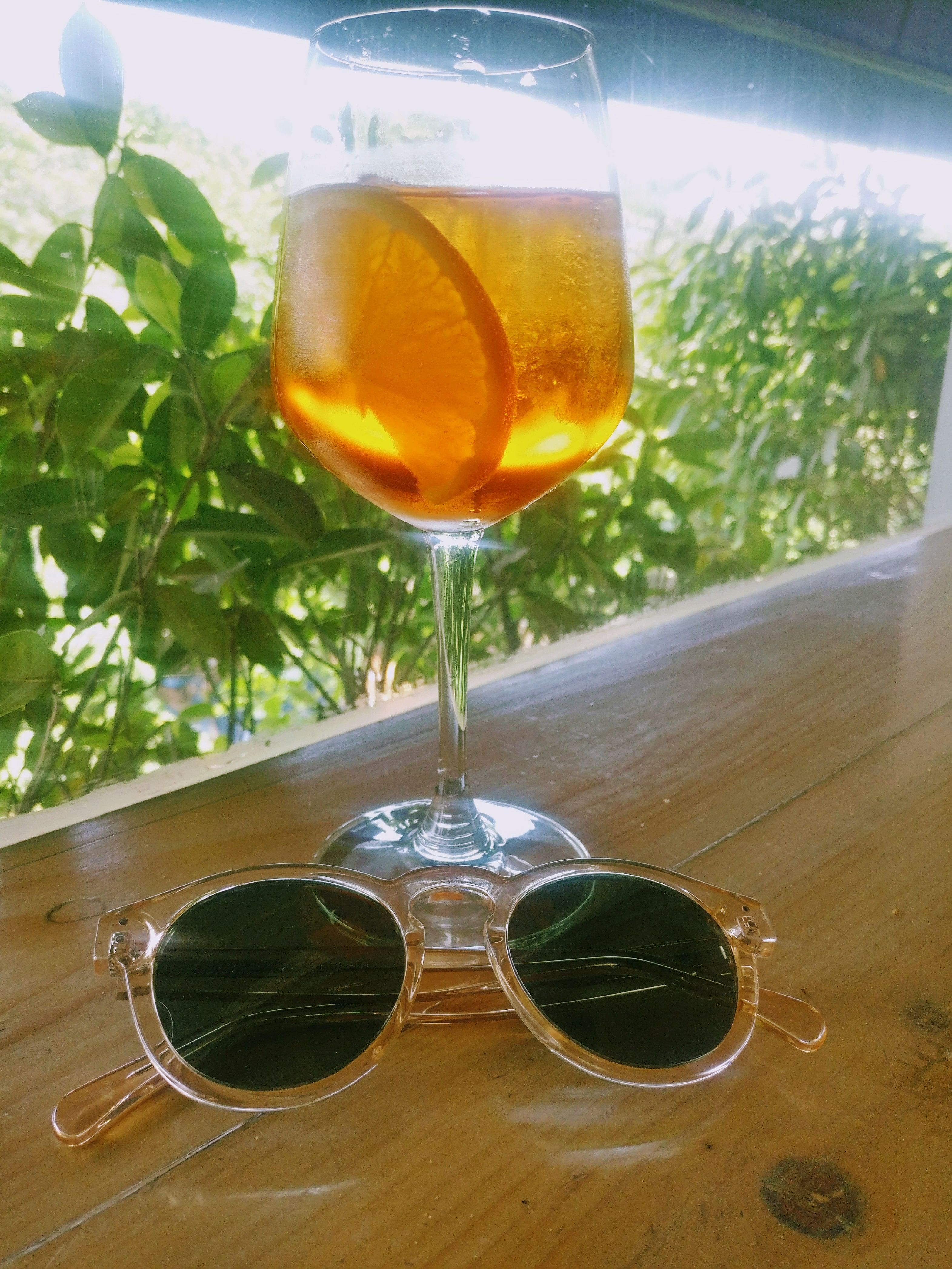 Drink,Glasses,Alcoholic beverage,Juice,Glass,Eyewear,Cocktail,Distilled beverage,Orange juice,Wine