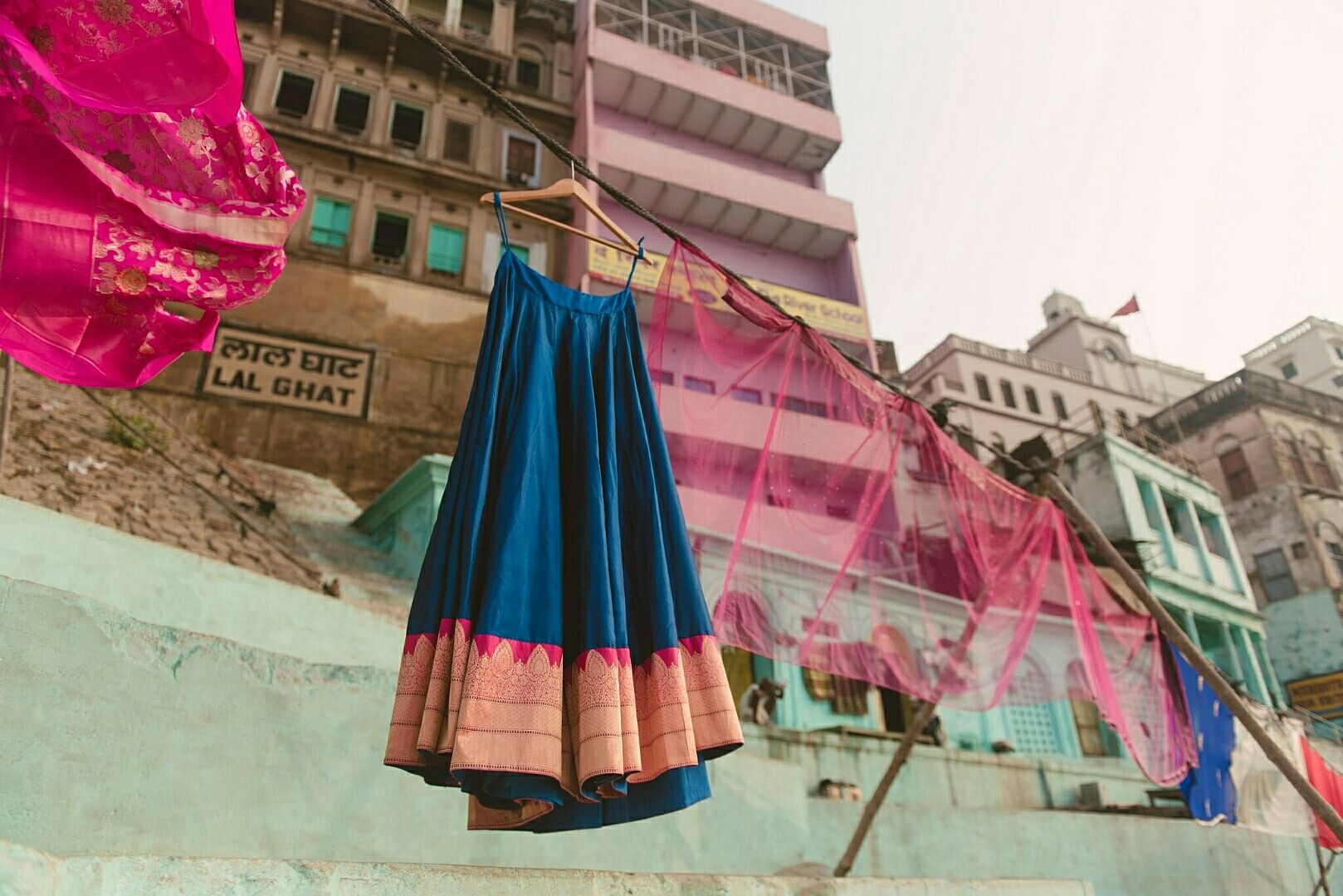 Pink,Blue,Red,Magenta,Textile,Architecture,Outerwear,Dress,Vacation,Window