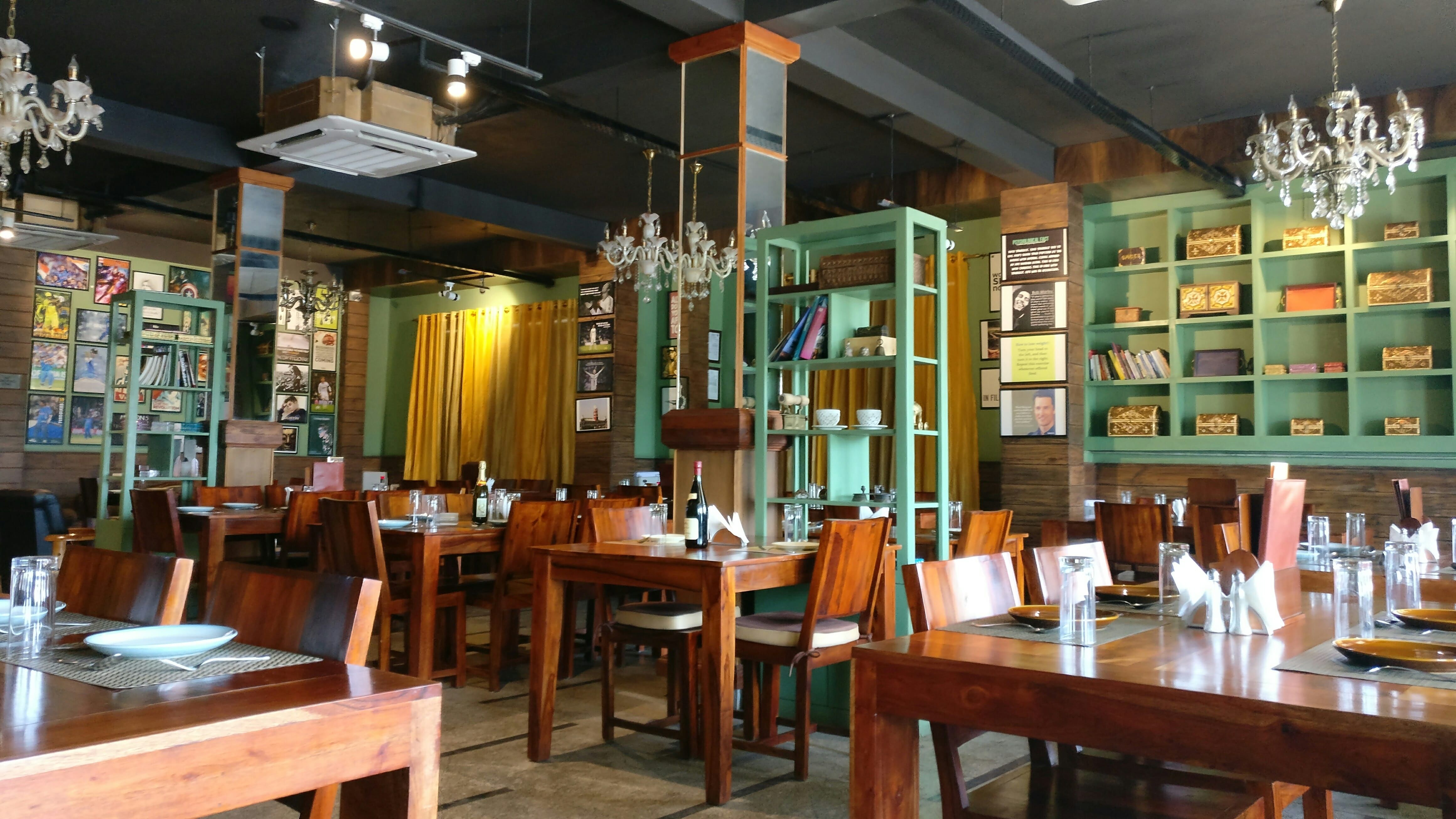 Restaurant,Building,Café,Room,Furniture,Interior design,Table,Coffeehouse,Tavern,Business