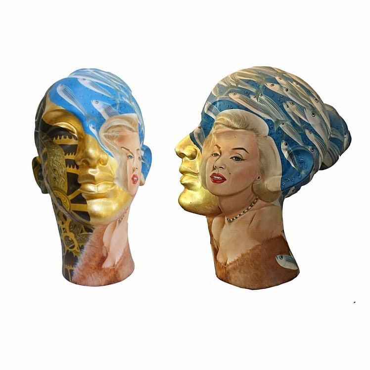 Face,Head,Forehead,Art,Jaw,Ear,Neck,Headgear,Sculpture,Fashion accessory