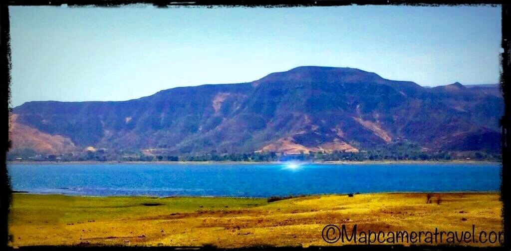 Nature,Natural landscape,Sky,Mountainous landforms,Highland,Mountain,Wilderness,Hill,Lake,Hill station