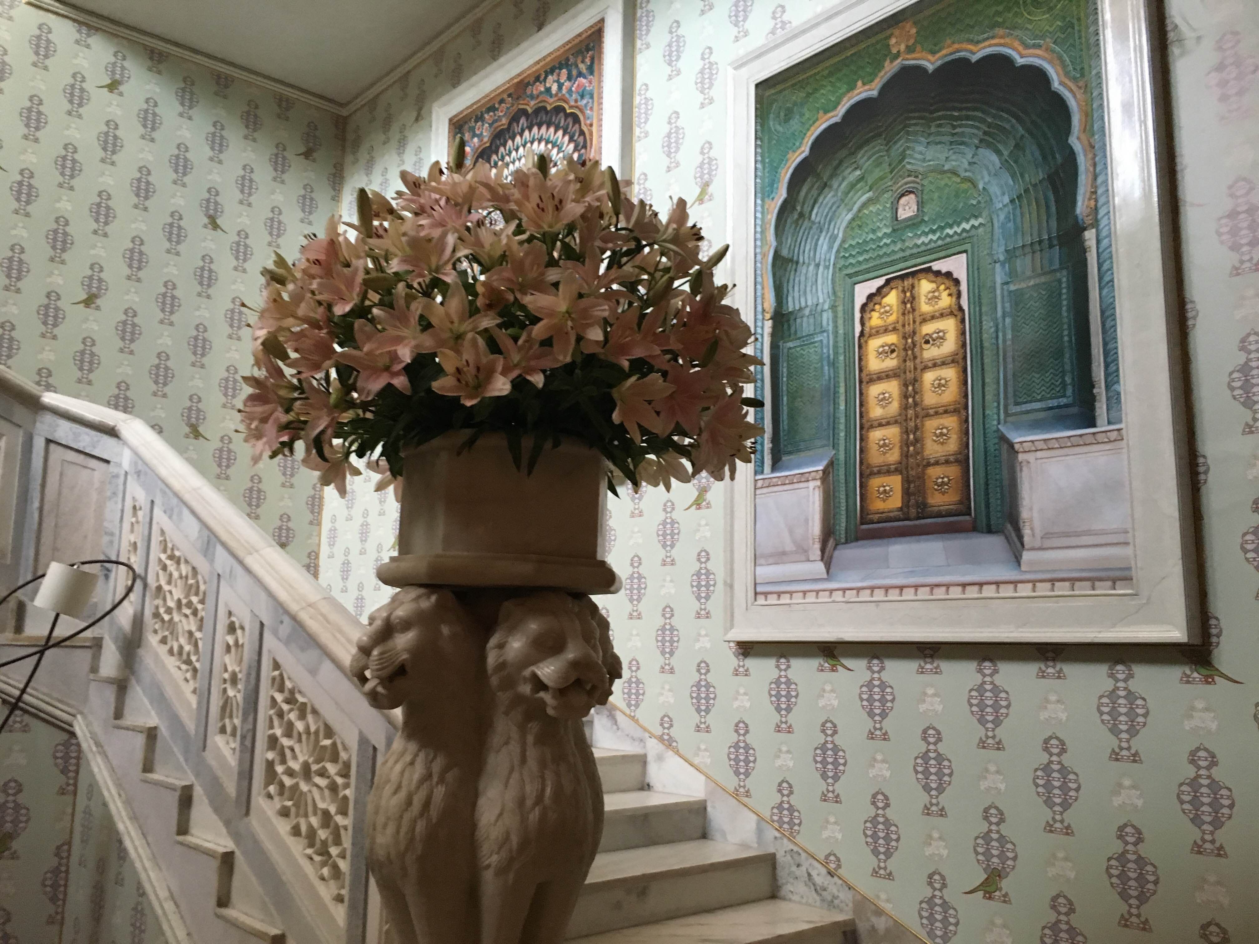 Flower,Plant,Architecture,Room,Arch,Interior design,Building,Still life,Floral design,Religious institute