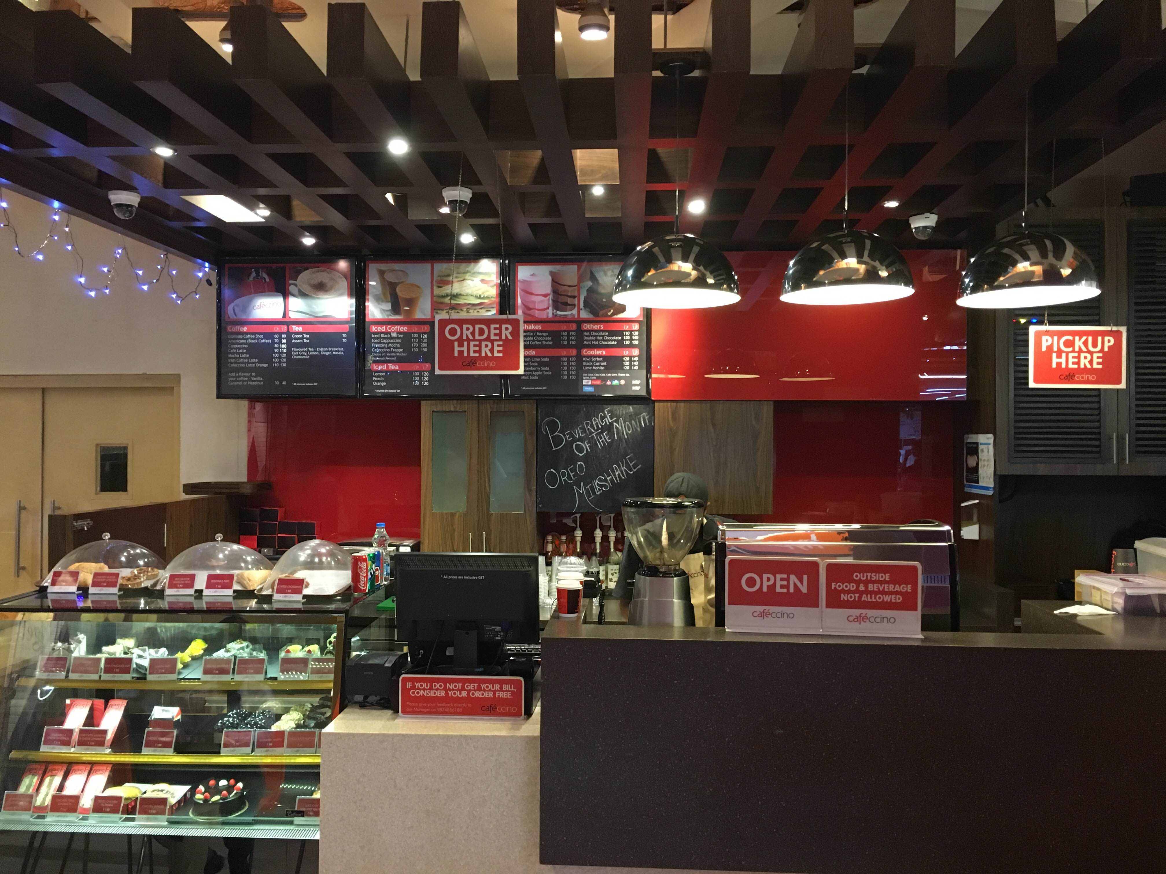 Building,Interior design,Restaurant,Fast food restaurant,Room,Architecture,Food court,Coffeehouse,Ceiling