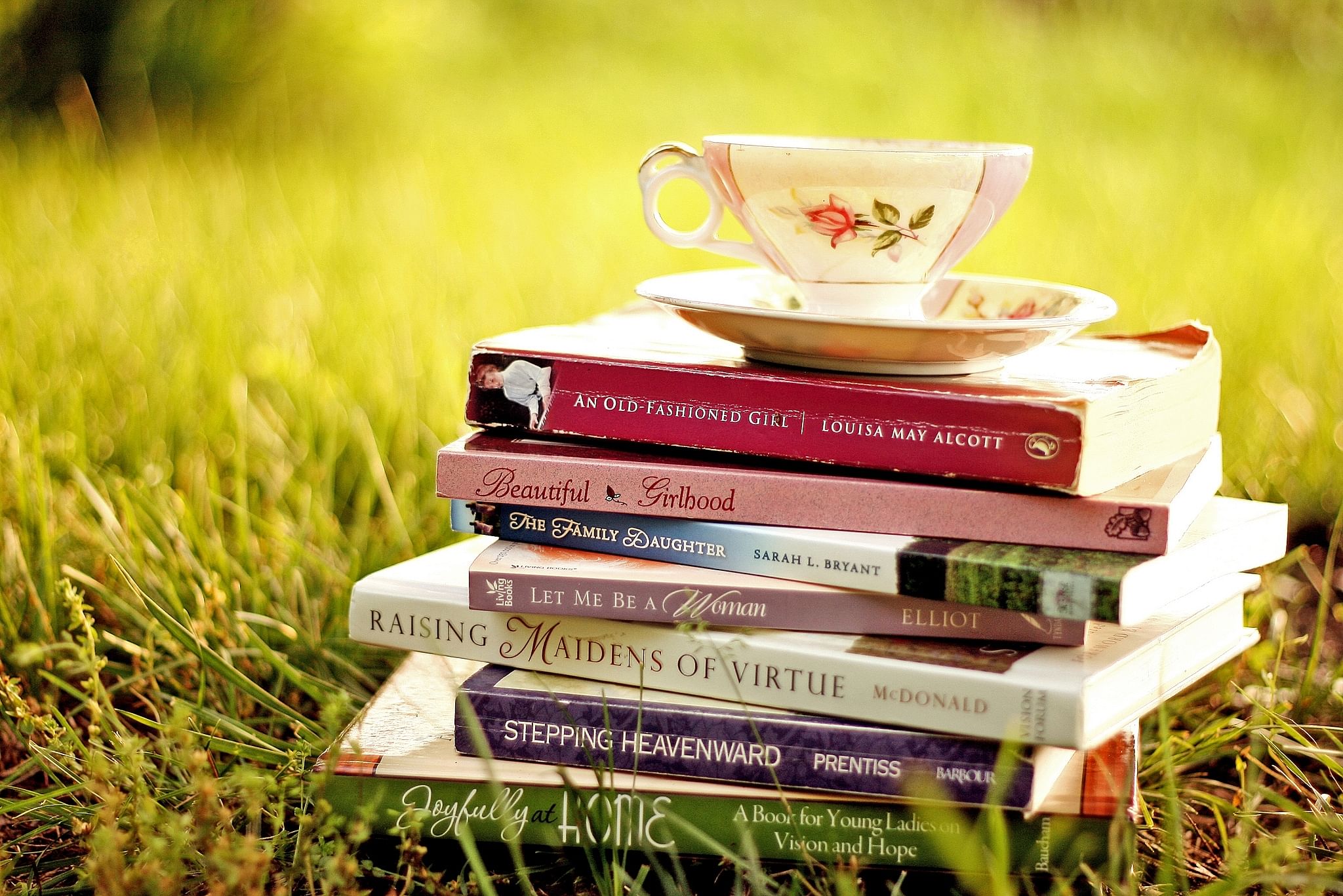 Grass,Book,Cup,Table,Teacup,Publication,Tree,Furniture,Coffee cup,Plant