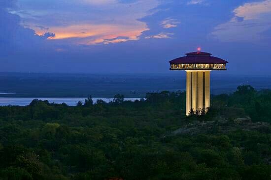 Sky,Landmark,Observation tower,Sea,Architecture,Cloud,Tourist attraction,Tower,Horizon,Tree