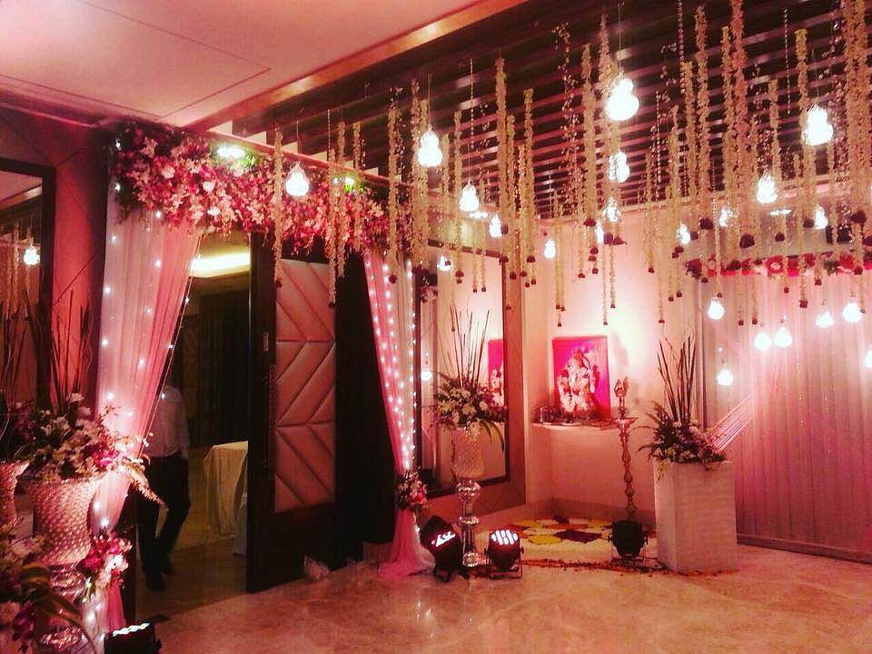 Decoration,Pink,Lighting,Function hall,Interior design,Room,Wedding reception,Building,Ceremony,Party