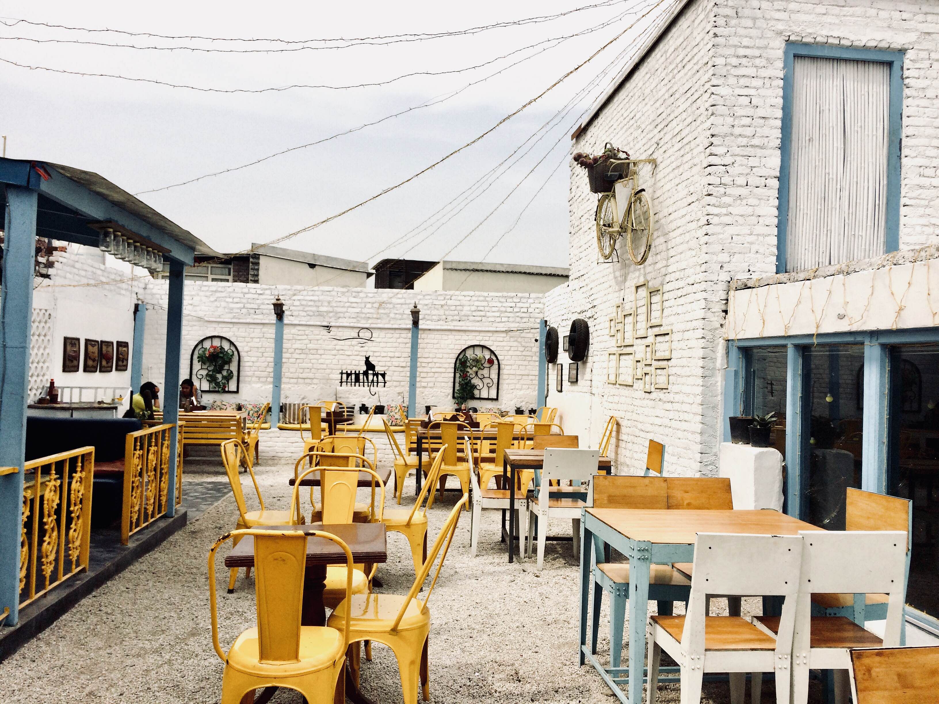 Yellow,Restaurant,Table,Building,Furniture,Room,House,Chair,Architecture,Vacation