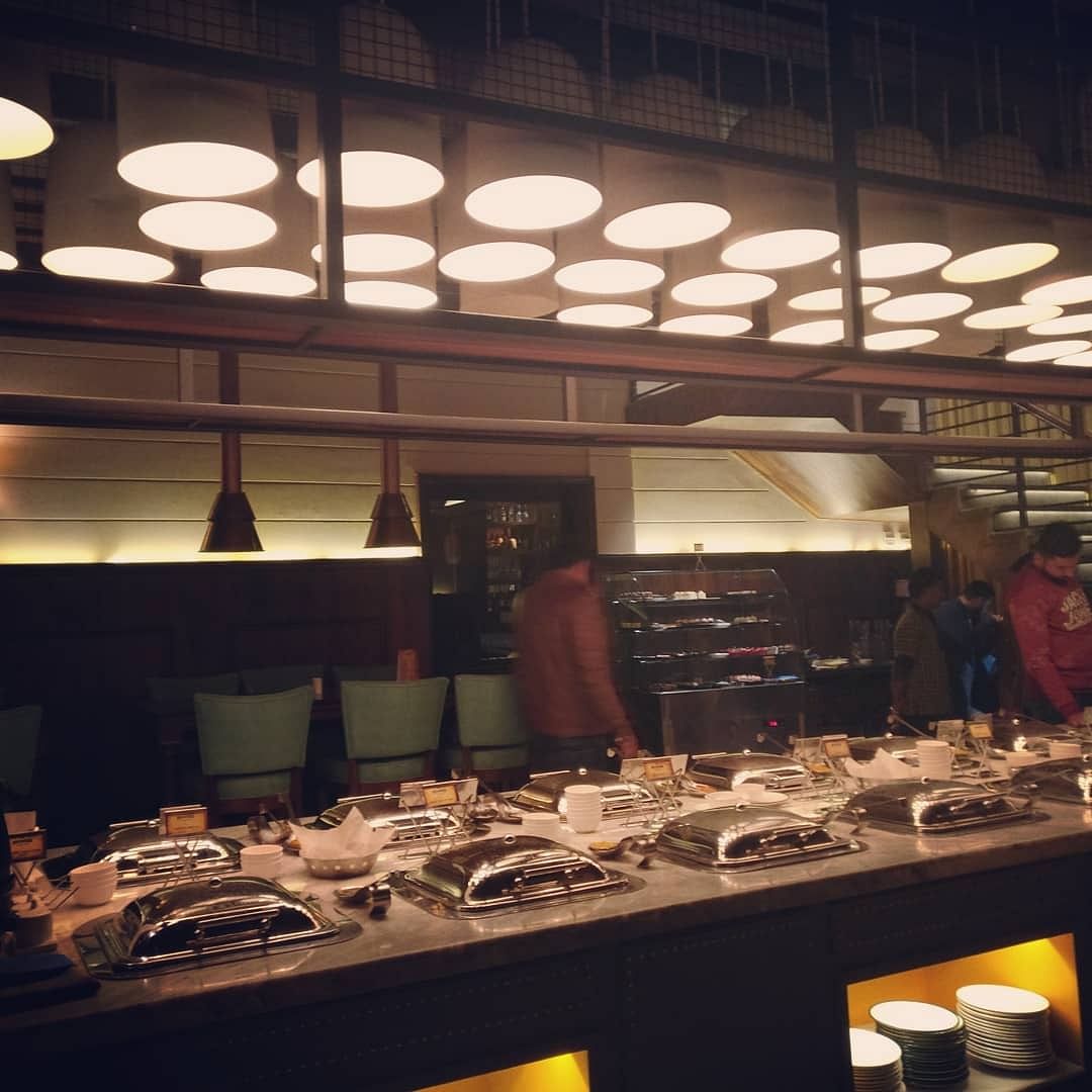 Restaurant,Building,Interior design,Food,Night,Cuisine,Bakery