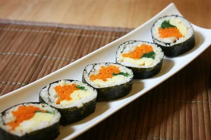 Dish,Gimbap,Cuisine,Food,Sushi,Nori,Ingredient,California roll,Comfort food,Garnish