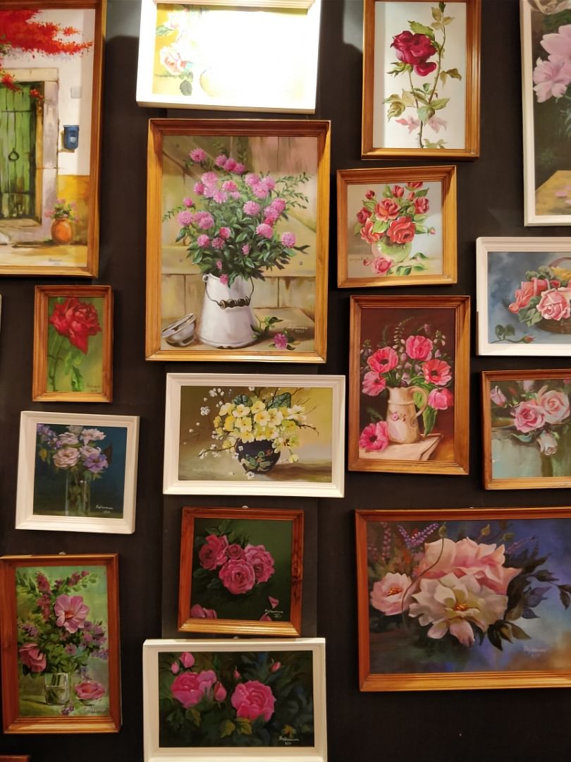 Pink,Flower,Collection,Plant,Picture frame,Room,Visual arts,Still life,Floral design,Art