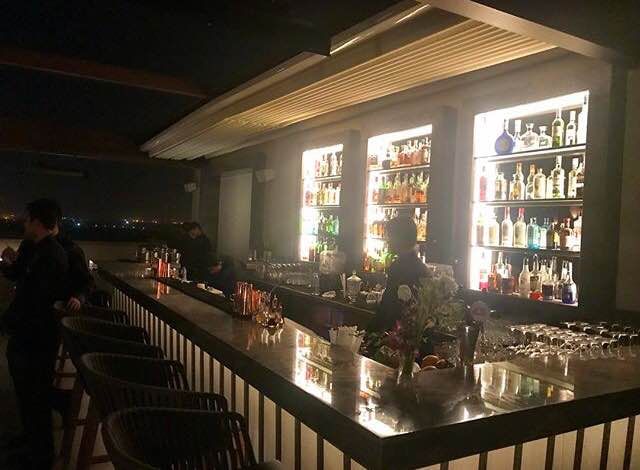 Building,Restaurant,Bar,Room,Architecture,Night,Interior design,Café,House