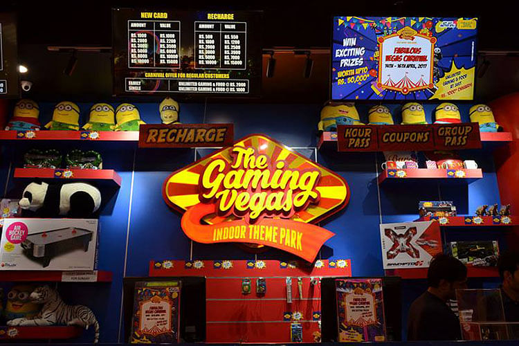 Electronic signage,Games,Fast food restaurant,Machine,Fast food,Building,Snack,Junk food,Signage