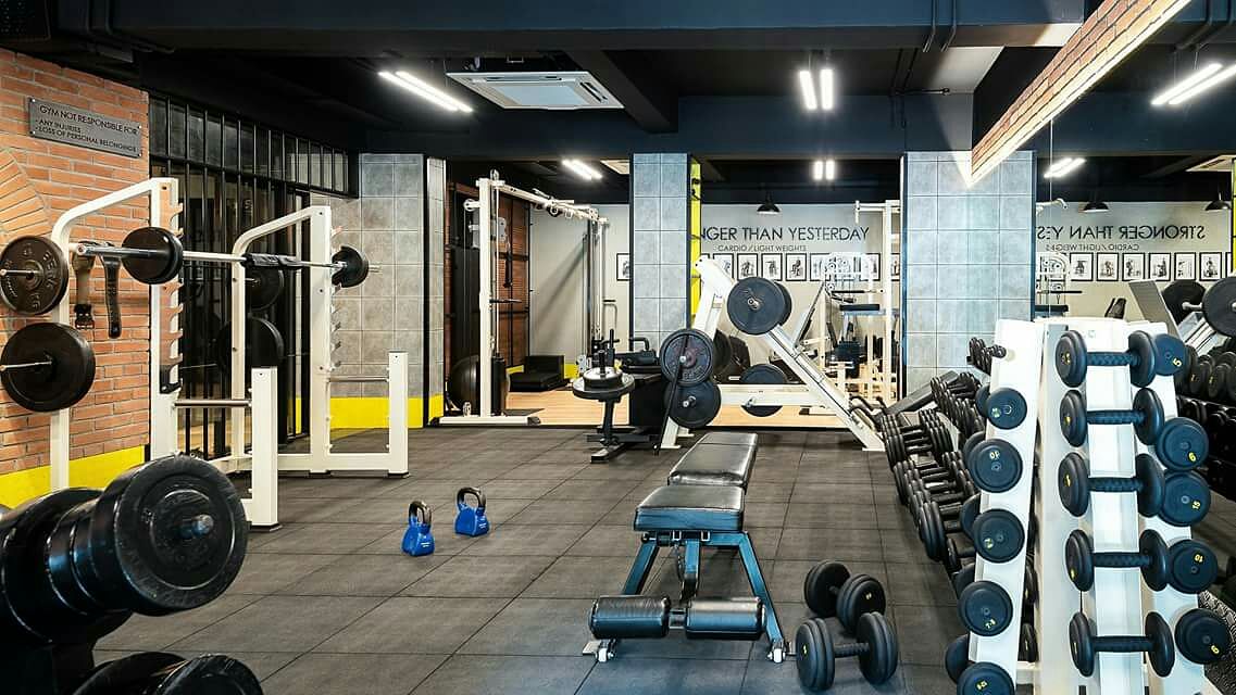 Gym,Physical fitness,Sport venue,Strength training,Room,Weight training,Exercise equipment,Barbell,Weights,Crossfit