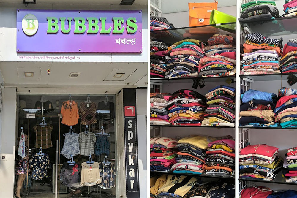 Clothing,Footwear,T-shirt,Outlet store,Shoe,Headgear,Room,Textile,Sportswear,Shirt