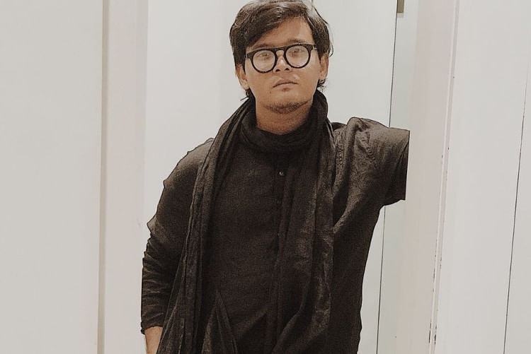 Eyewear,Glasses,Human,Facial hair,Beard,Outerwear,Vision care,Textile,Photography,Neck