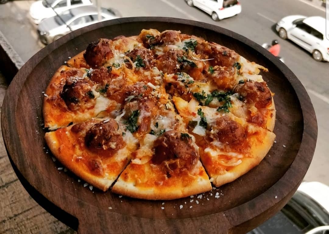 Dish,Food,Pizza,Cuisine,Pizza cheese,California-style pizza,Ingredient,Flatbread,Italian food,Pizza stone