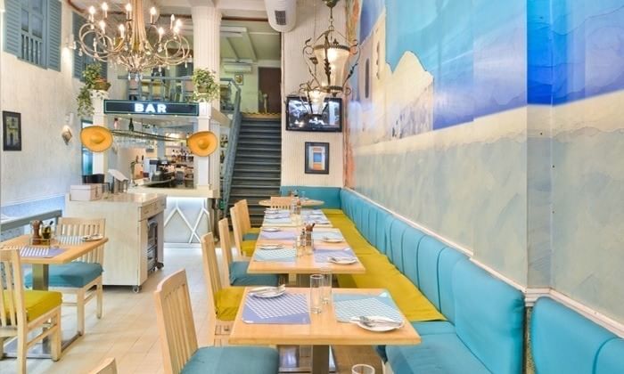 Room,Interior design,Turquoise,Restaurant,Building,Table,Furniture,Dining room,Brunch,Ceiling