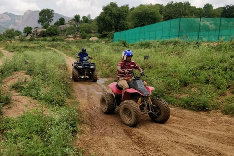 Land vehicle,Vehicle,All-terrain vehicle,Off-roading,Soil,Dirt road,Off-road racing,Trail,Adventure,Grass