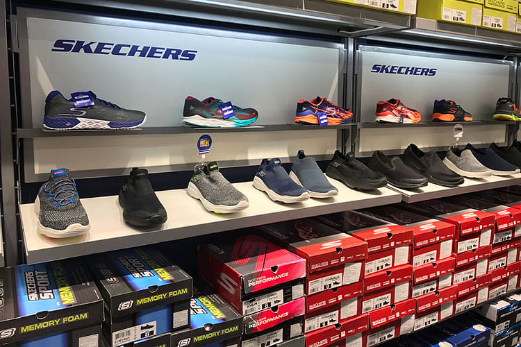 Footwear,Shoe store,Shoe,Retail,Sportswear,Outlet store,Building,Athletic shoe,Display case,Collection