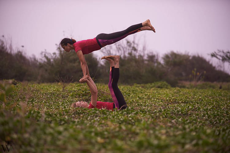 People in nature,Acrobatics,Grass,Physical fitness,Balance,Performance,Arm,Flip (acrobatic),Stretching,Happy
