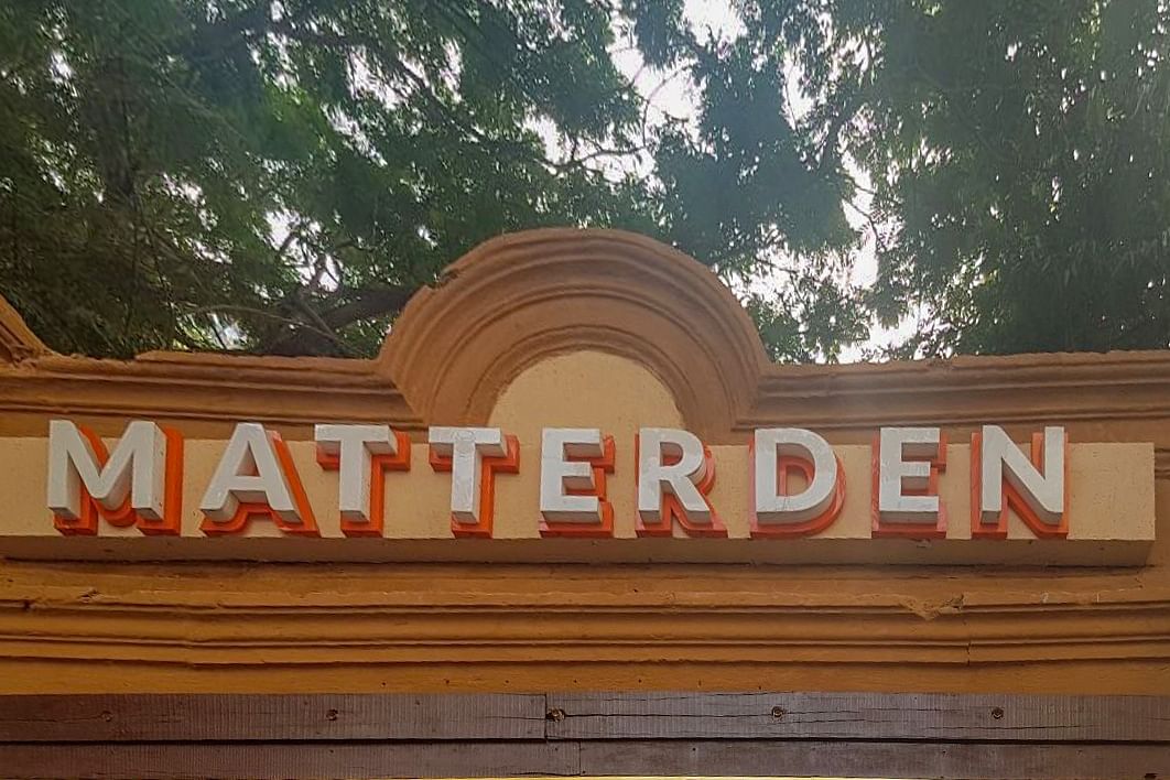 Font,Signage,Wood,Tree,Architecture,Tourism,Sign,National park,Vacation,Tourist attraction