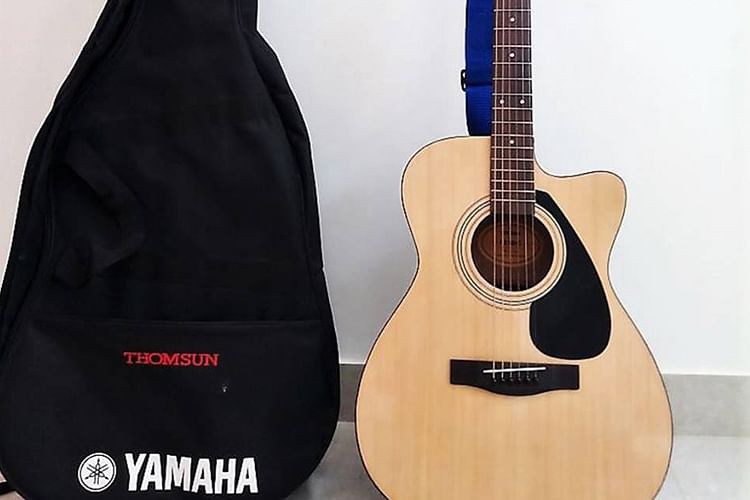 Guitar,Musical instrument,String instrument,Plucked string instruments,Acoustic guitar,String instrument,Acoustic-electric guitar,String instrument accessory,Cuatro,Tiple
