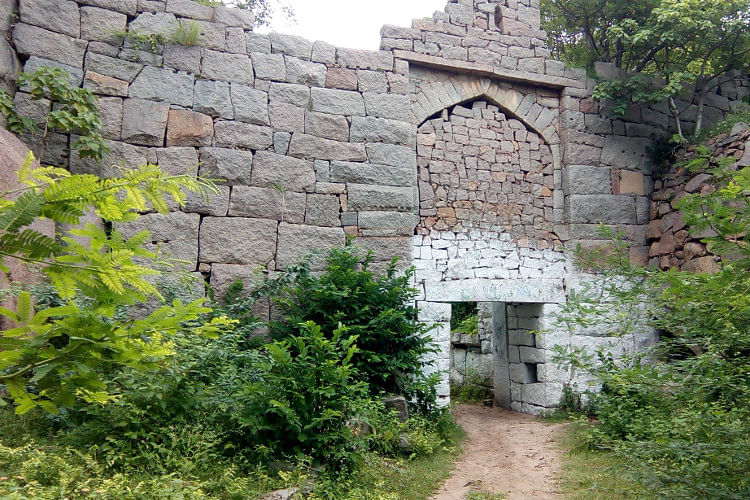 Wall,Property,House,Building,Cottage,Stone wall,Rural area,Tree,Village,Brick