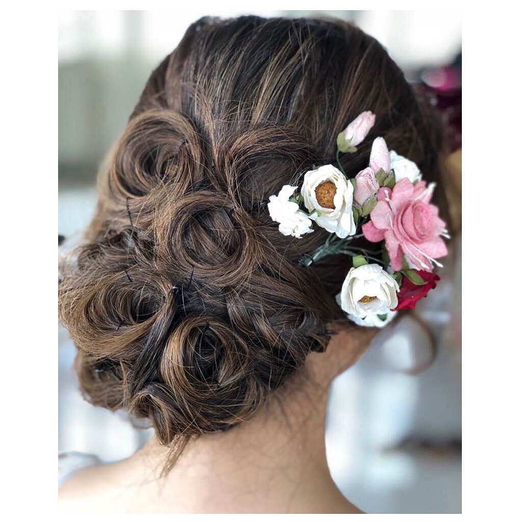 Hair,Hairstyle,Chignon,Beauty,Long hair,Head,Headpiece,Brown hair,Forehead,Bun