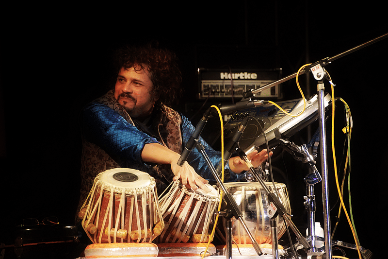 Tabla,Drum,Percussionist,Musical instrument,Percussion,Musician,Music,Performance,String instrument,Drums