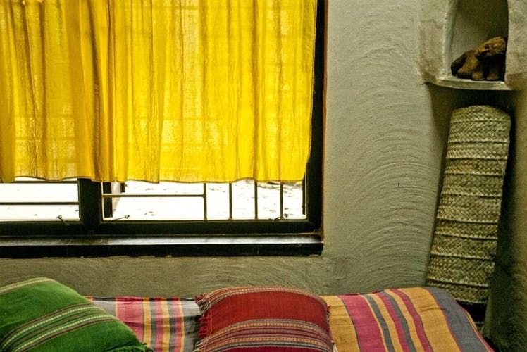 Curtain,Window treatment,Interior design,Yellow,Window covering,Room,Textile,Furniture,Window,Window valance