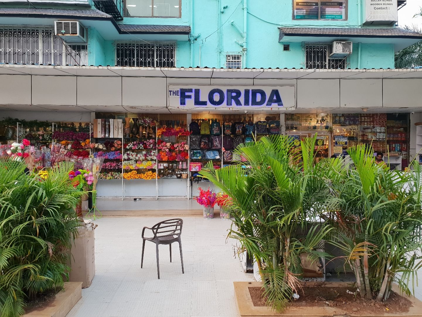 Building,Floristry,Plant,Flower,Flowerpot,Outlet store,Mixed-use,Houseplant,Retail