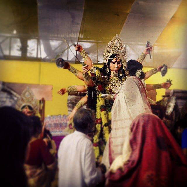 Yellow,Sky,Event,Tradition,Ritual,Crowd,Temple,Religious item,Cloud,Ceremony