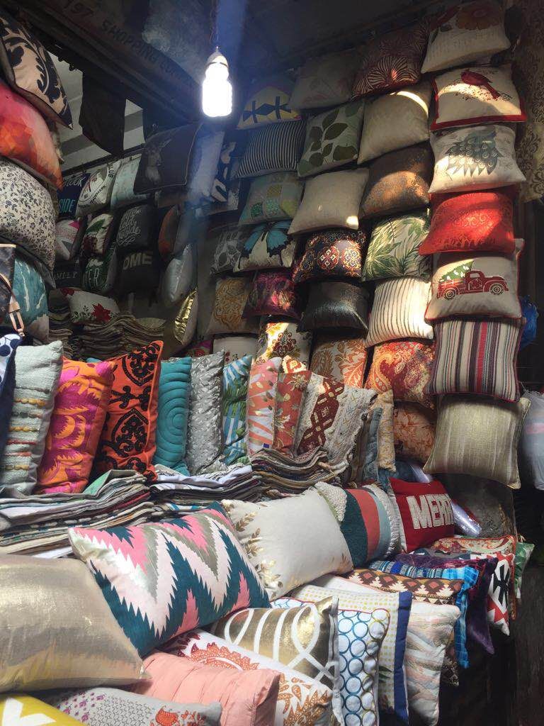 Bazaar,Market,Public space,Human settlement,Textile,Selling,Marketplace,City,Room,Building