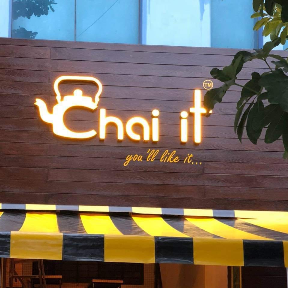 Yellow,Electronic signage,Signage,Font,Neon sign,Neon,Restaurant,Sign,Building,Facade