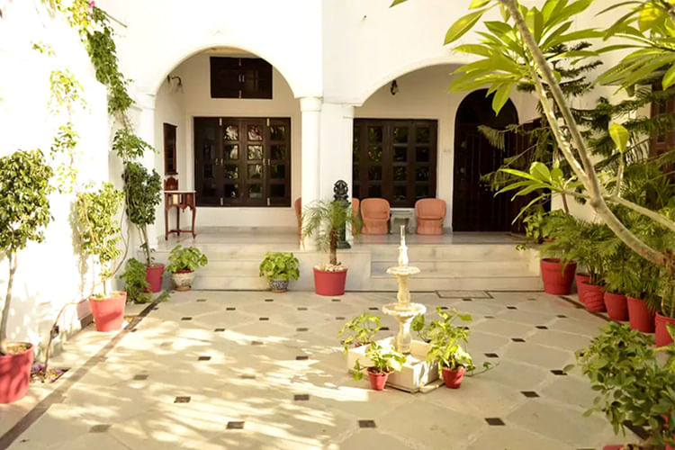 Property,Courtyard,Building,Real estate,House,Hacienda,Patio,Room,Architecture,Interior design