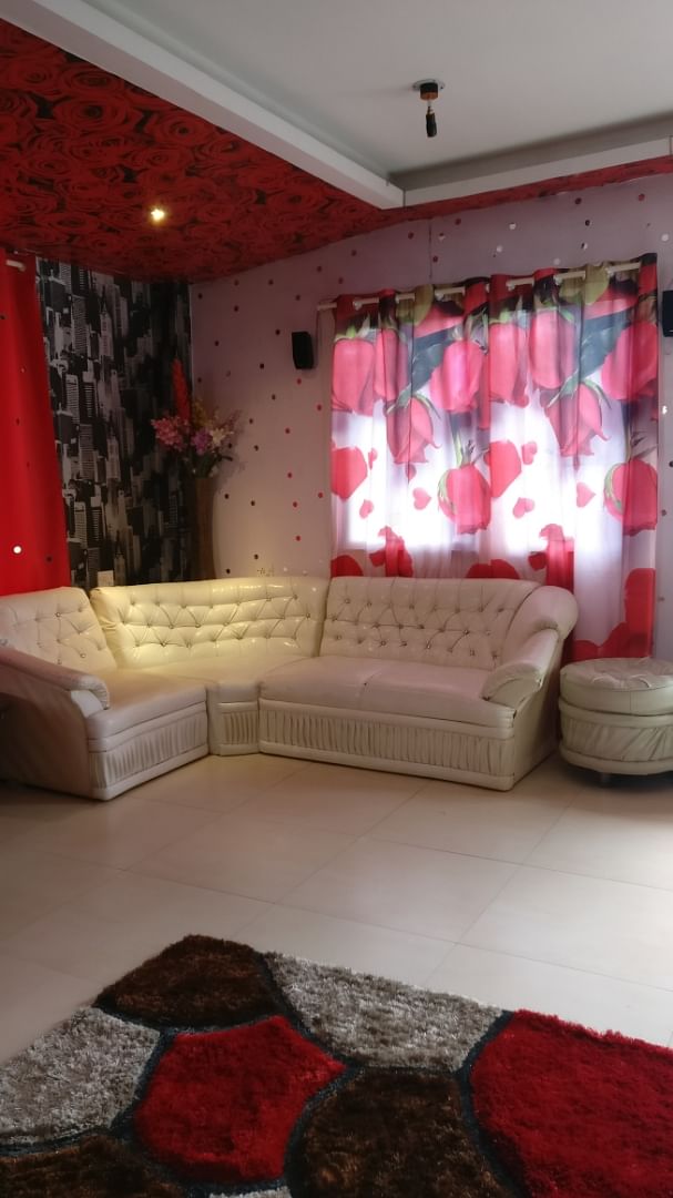 Room,Furniture,Interior design,Property,Red,Living room,Couch,Wall,Curtain,House