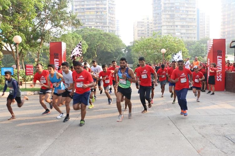 Athlete,Running,Marathon,Long-distance running,Recreation,Outdoor recreation,Red,Sports,Athletics,Individual sports