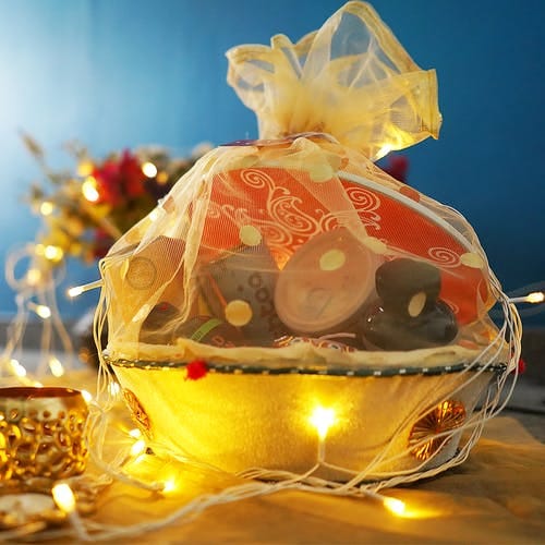 Present,Gift basket,Food,Mishloach manot,Party favor,Christmas ornament,Ornament,Hamper
