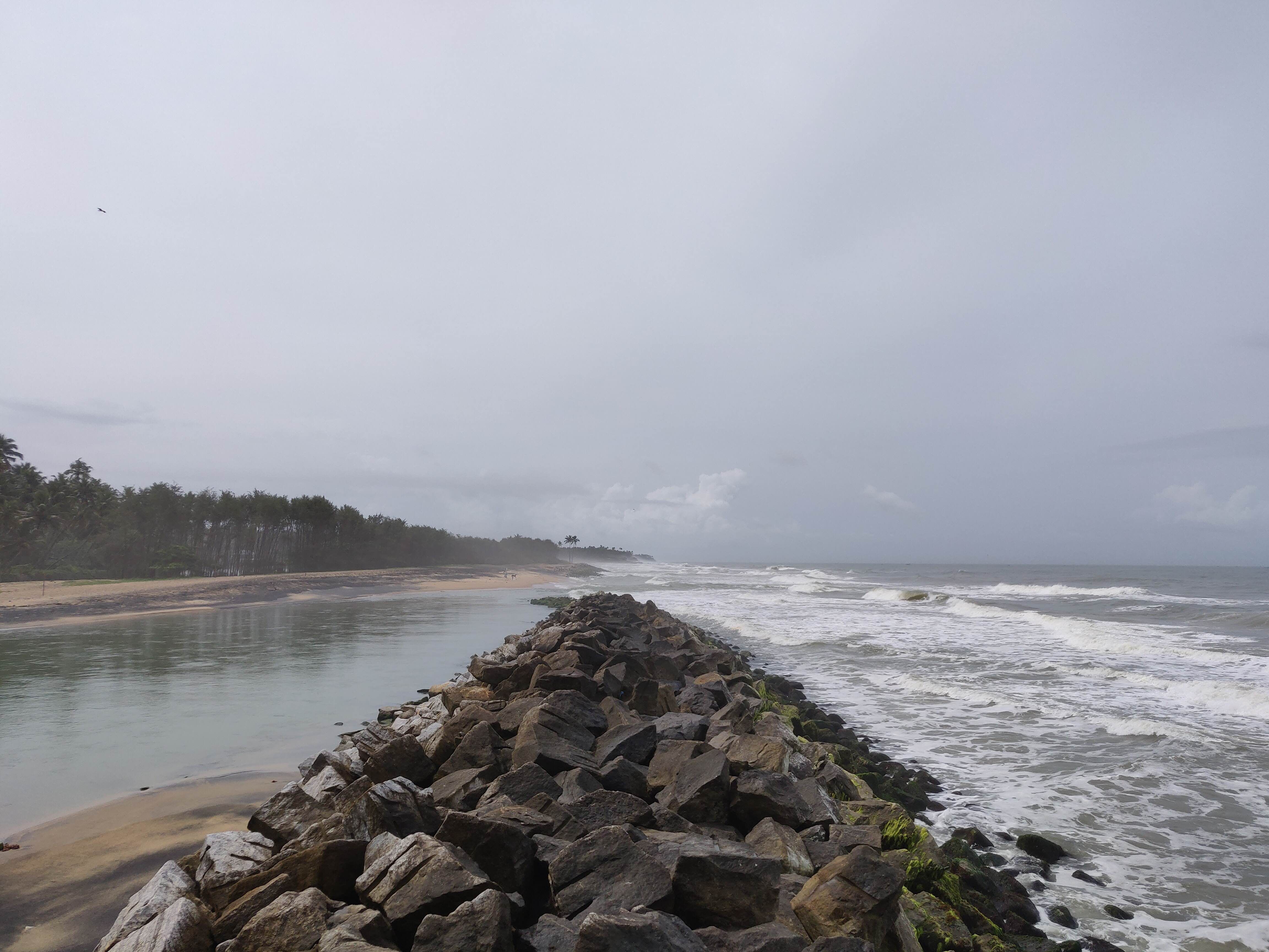 Water,Shore,Sea,Coast,Atmospheric phenomenon,Sky,Wave,Rock,Ocean,Beach