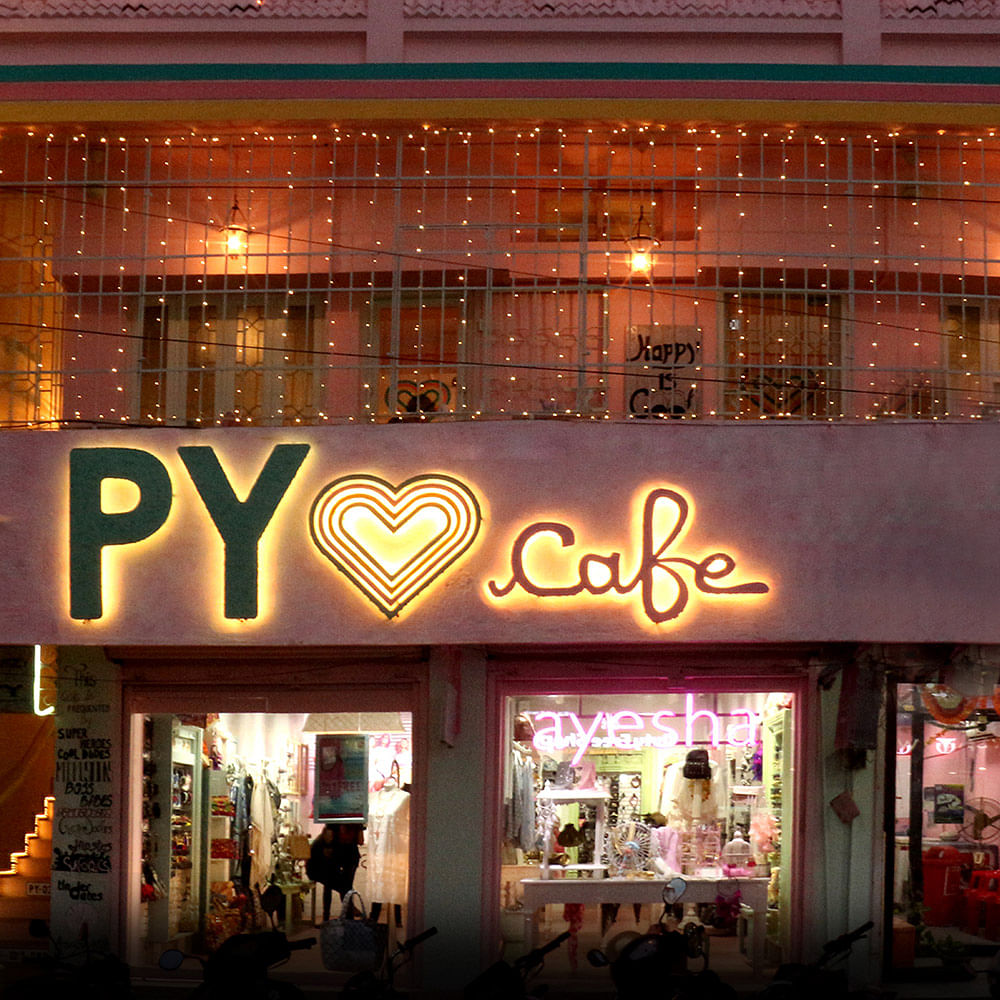 Building,Lighting,Facade,Font,Night,Architecture,Neon,Restaurant,Mixed-use,Outlet store