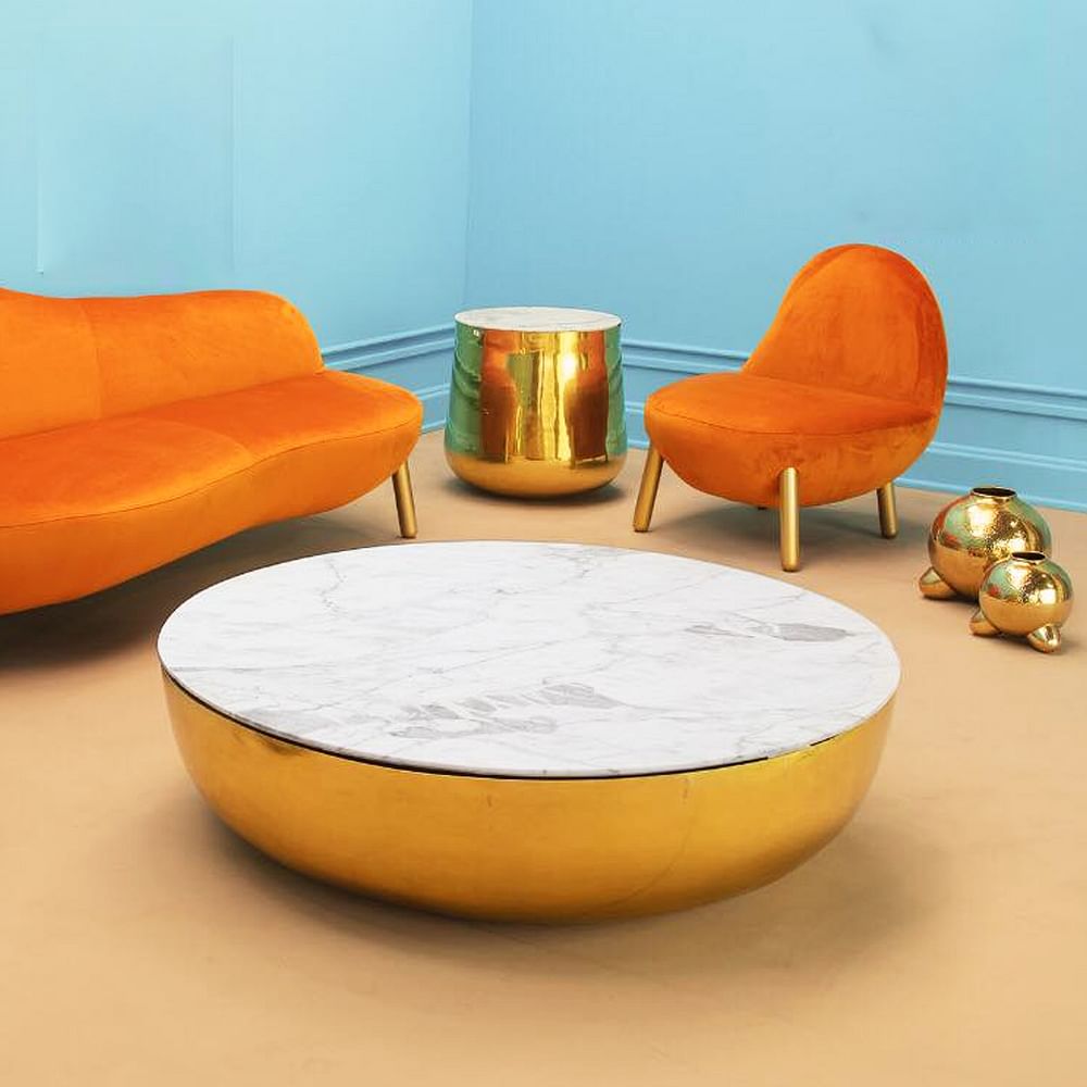 Orange,Furniture,Coffee table,Table,Yellow,Couch,Interior design,Ottoman,Room,Chair