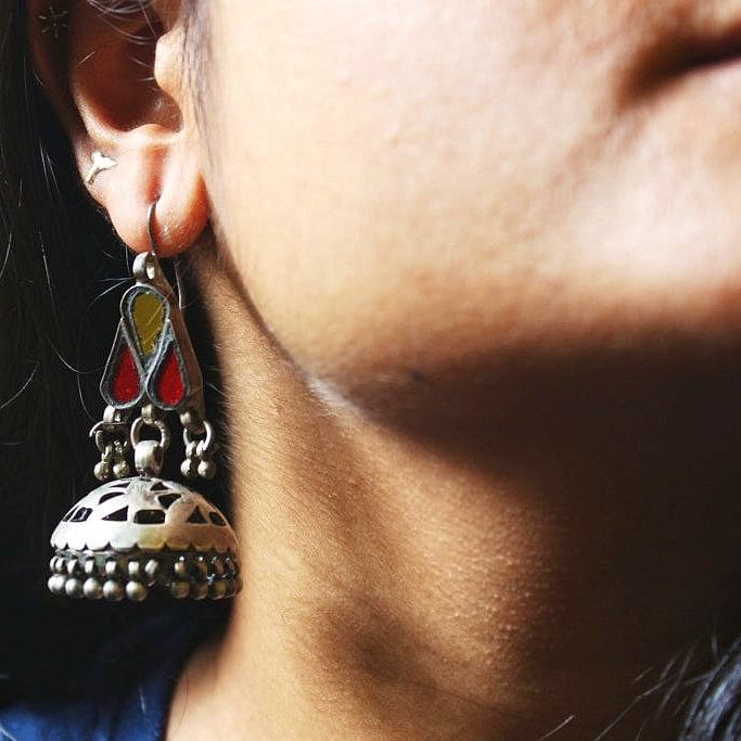 Face,Ear,Earrings,Neck,Lip,Nose,Cheek,Chin,Organ,Jewellery